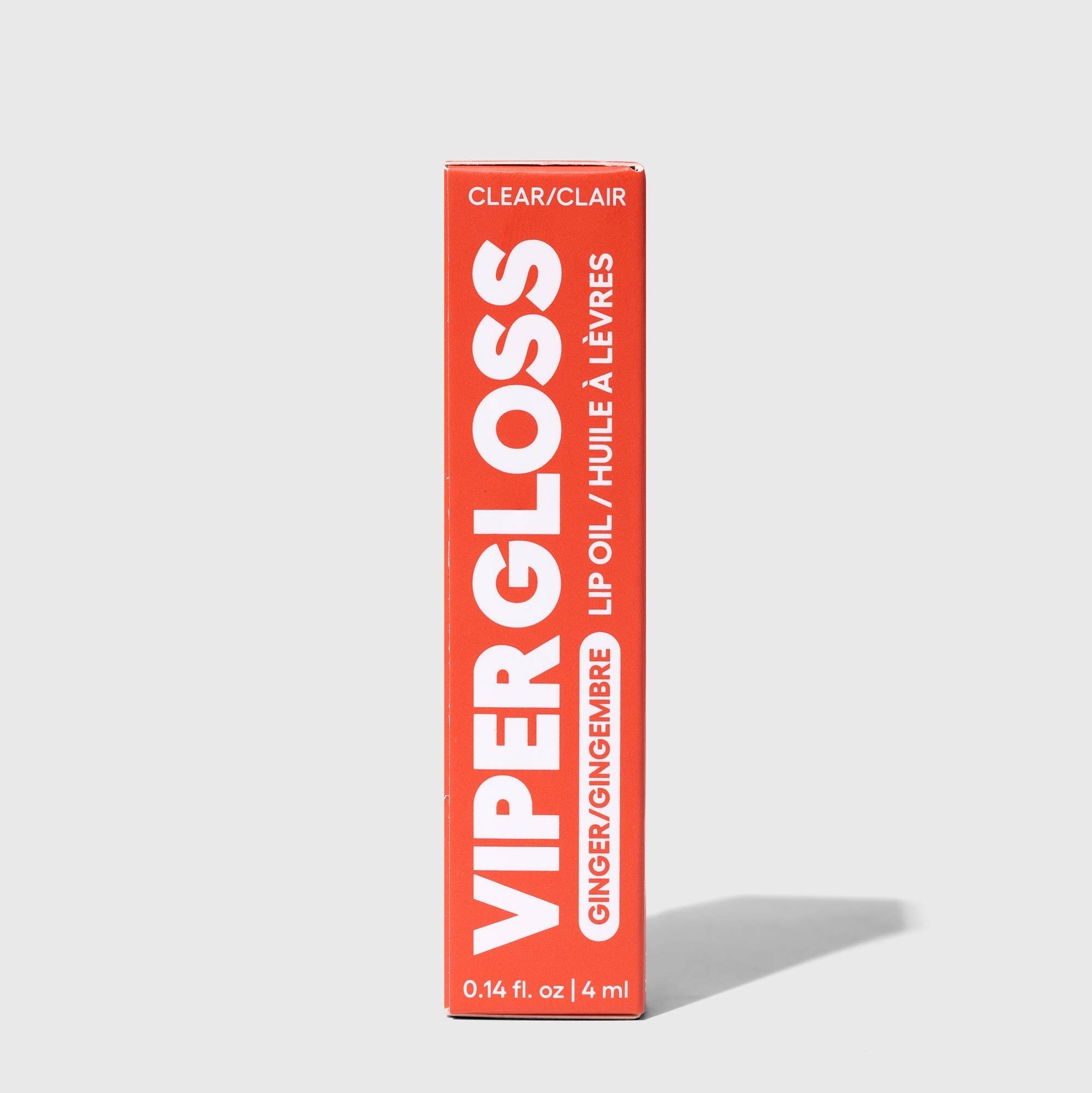 Viper Gloss lip oil packaging on a light gray background